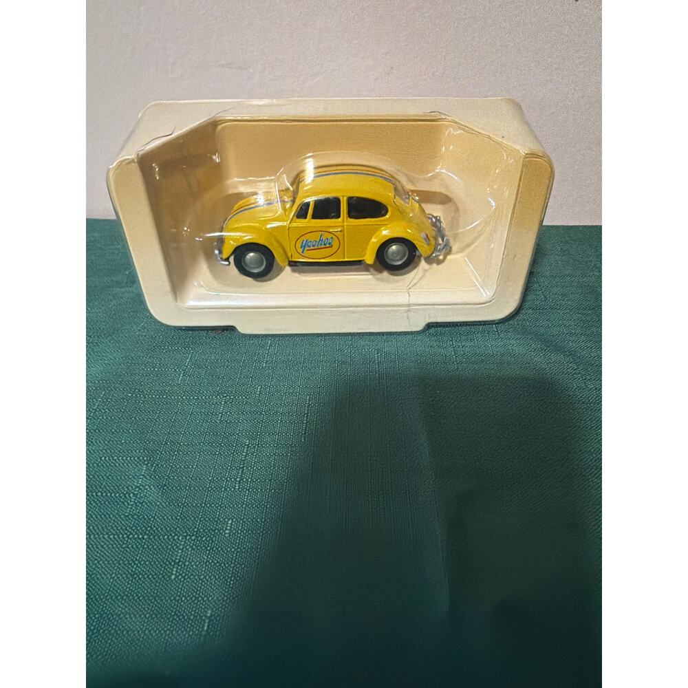 Corgi Yoo-Hoo online exclusive die-cast model‎ of a Volkswagen Bug 1200 Saloon.